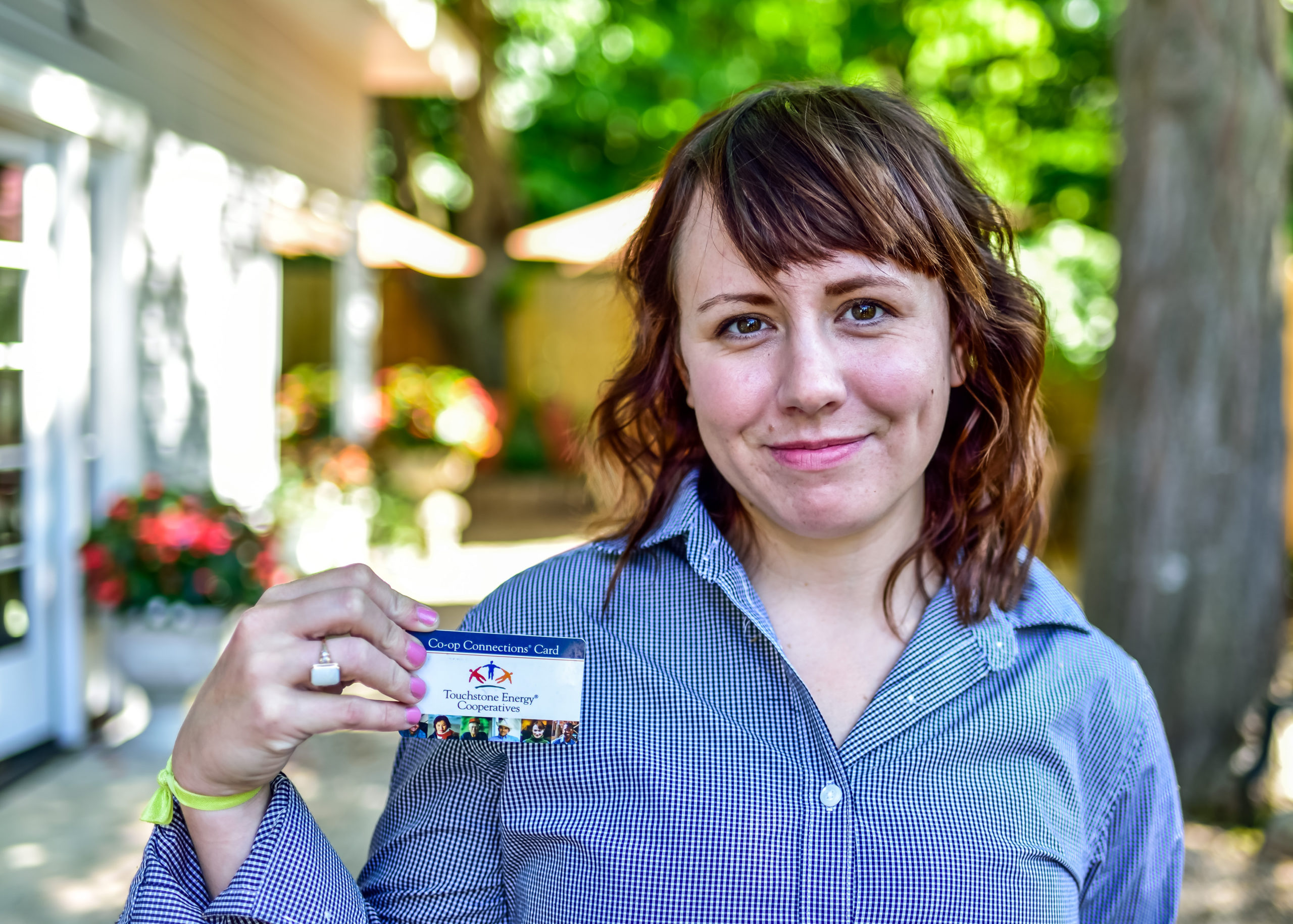 woman holding card