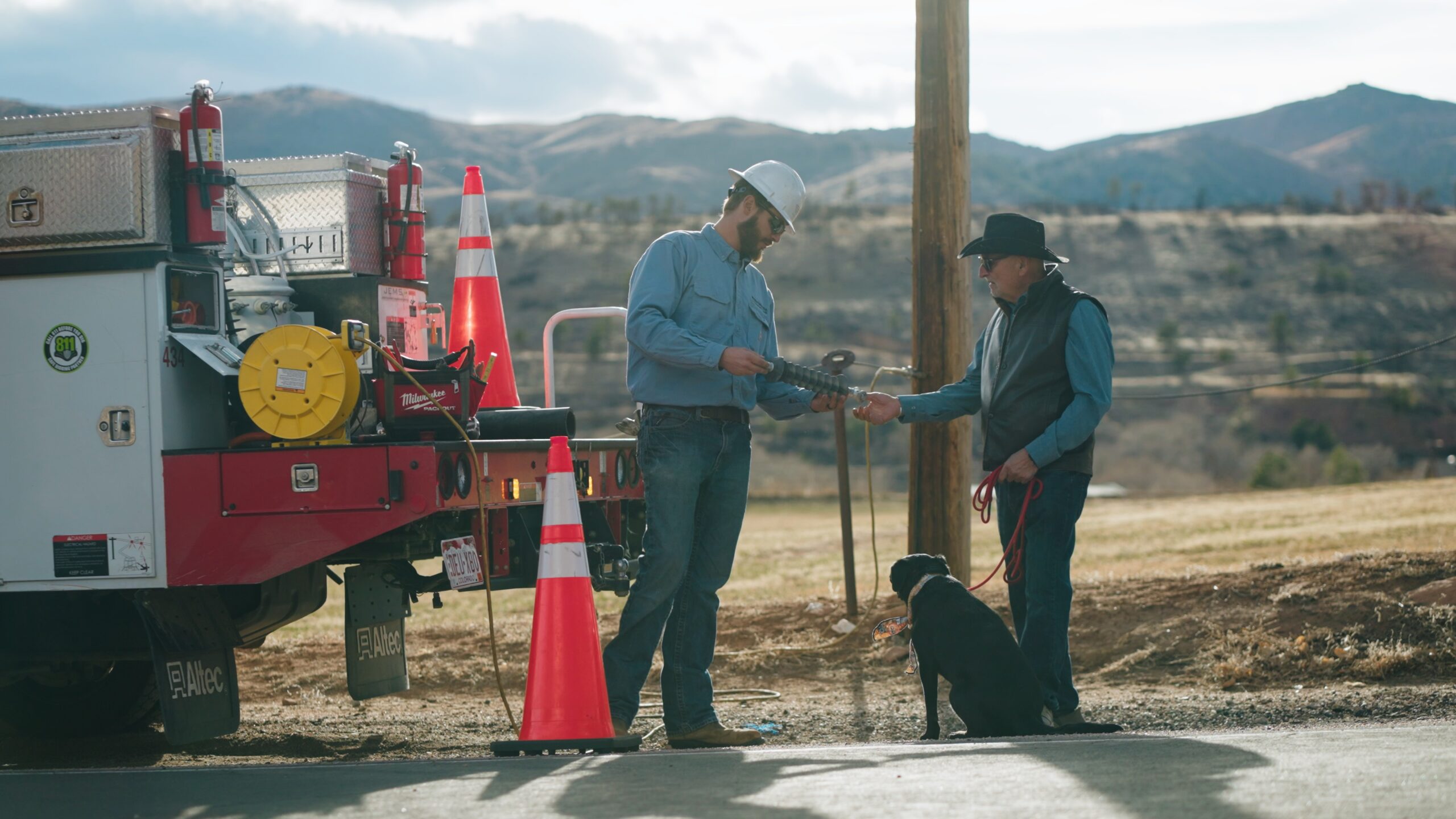 PVREA lineman talking to member