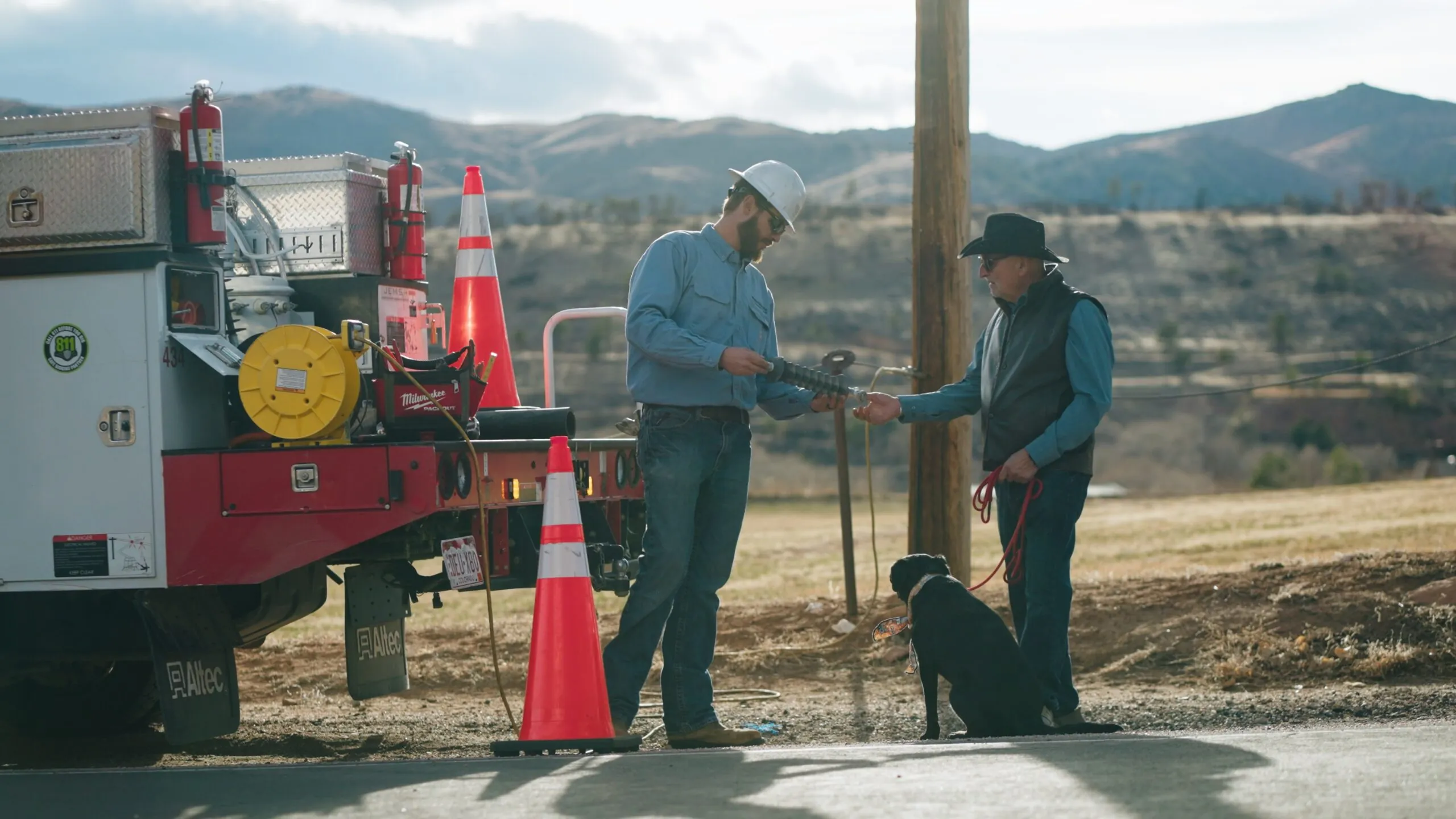 PVREA lineman talking to member