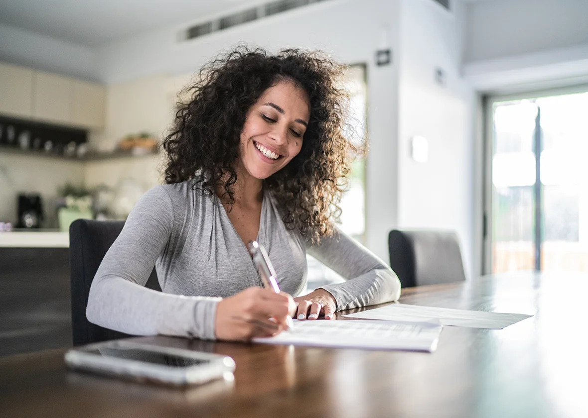 Woman Filling Out A Form
