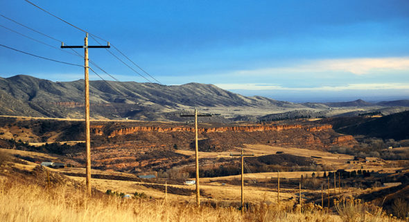 Plains hills with a bluff and powerlines