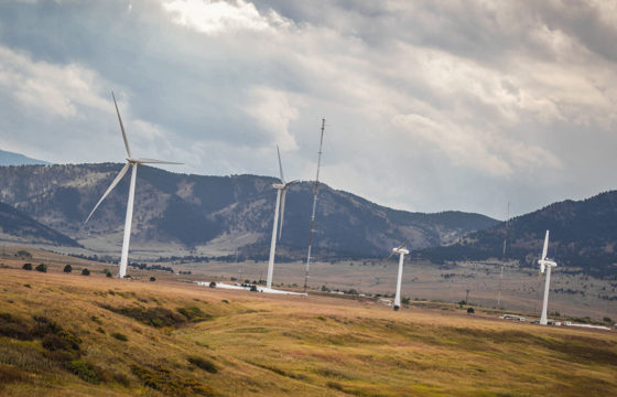 Wind Turbines Against Mountainous Background