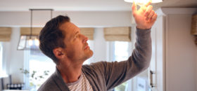 man installing light