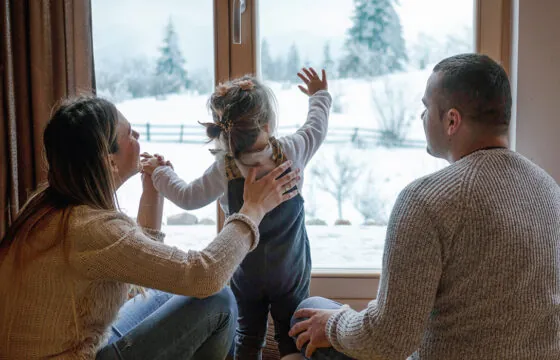 How Cold Weather Impacts Your Energy Bill header image - family inside home